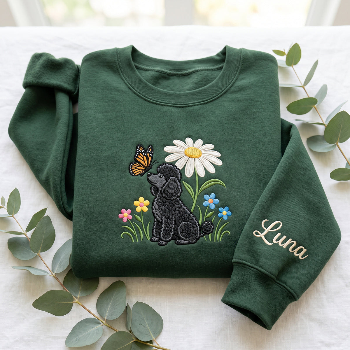 Personalized Black Poodle Wildflowers Butterfly Daisy Spring embroidered sweatshirt — front view