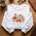 Personalized Cozy Foxes Reading Books Woodland Mushroom Acorn embroidered sweatshirt — front view