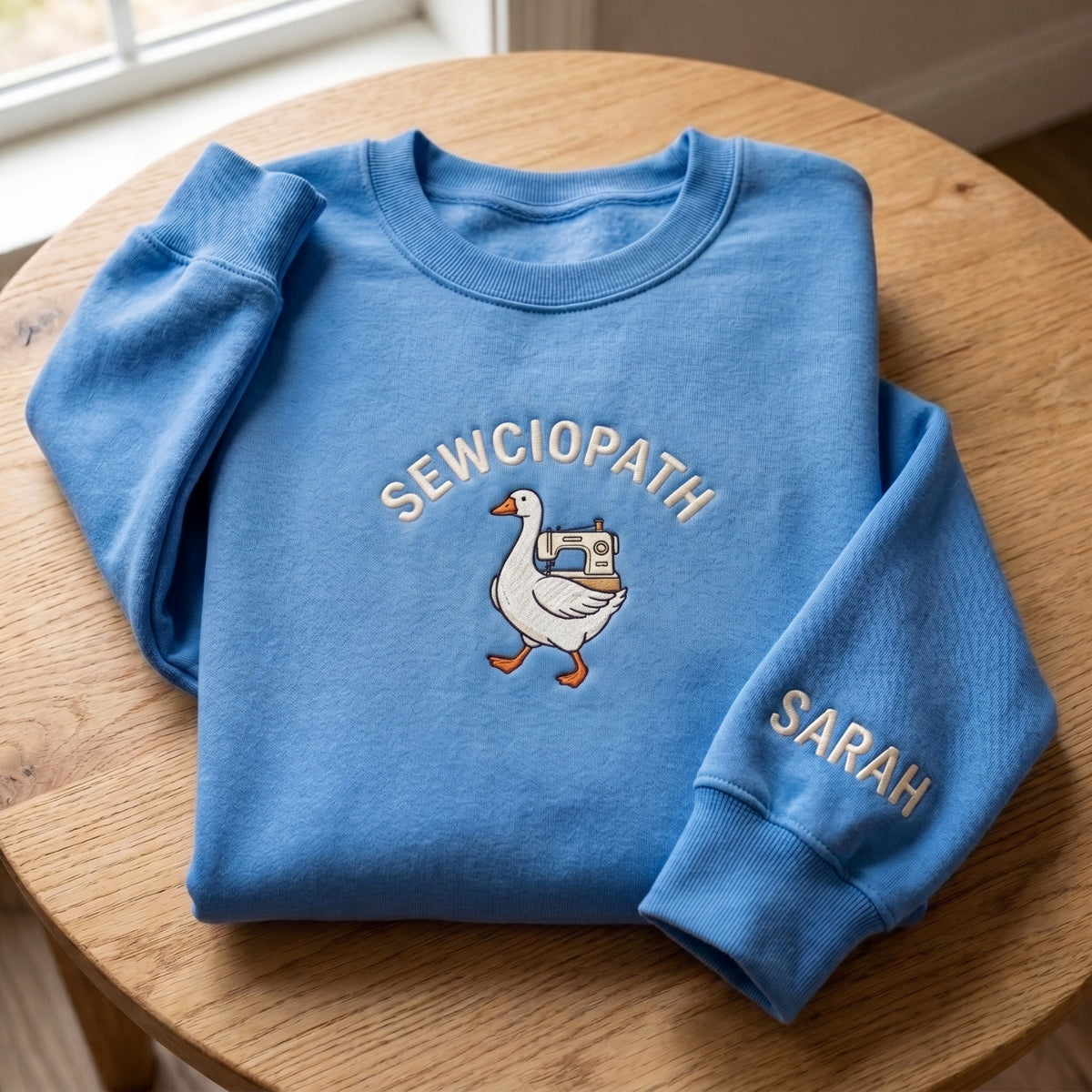 Personalized Sewciopath Goose Sewing Machine embroidered sweatshirt — front view