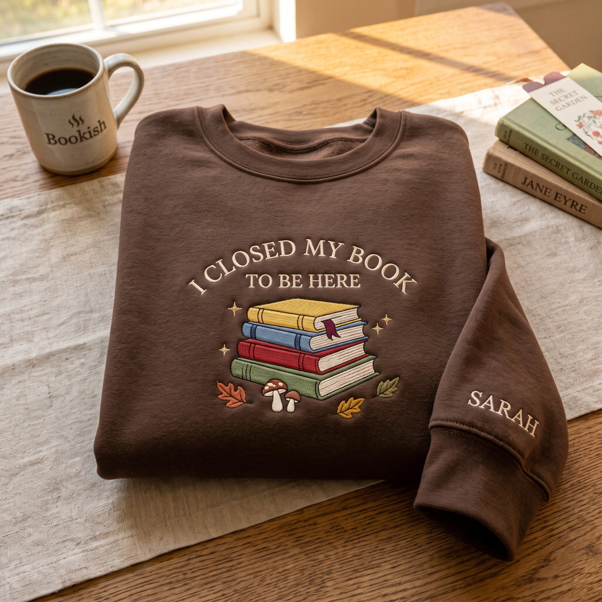Personalized I Closed My Book to Be Here Stack Books Mushroom Fall Leaves embroidered sweatshirt — front view