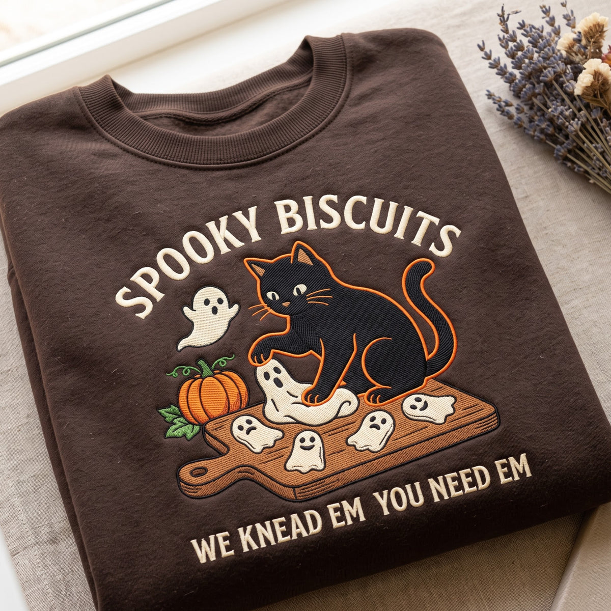 Spooky Biscuits Black Cat Ghost Halloween We Knead Em You Need Em embroidered sweatshirt — front view