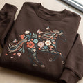 Floral Horse Wildflower Butterfly Boho Running Horse embroidered sweatshirt — front view