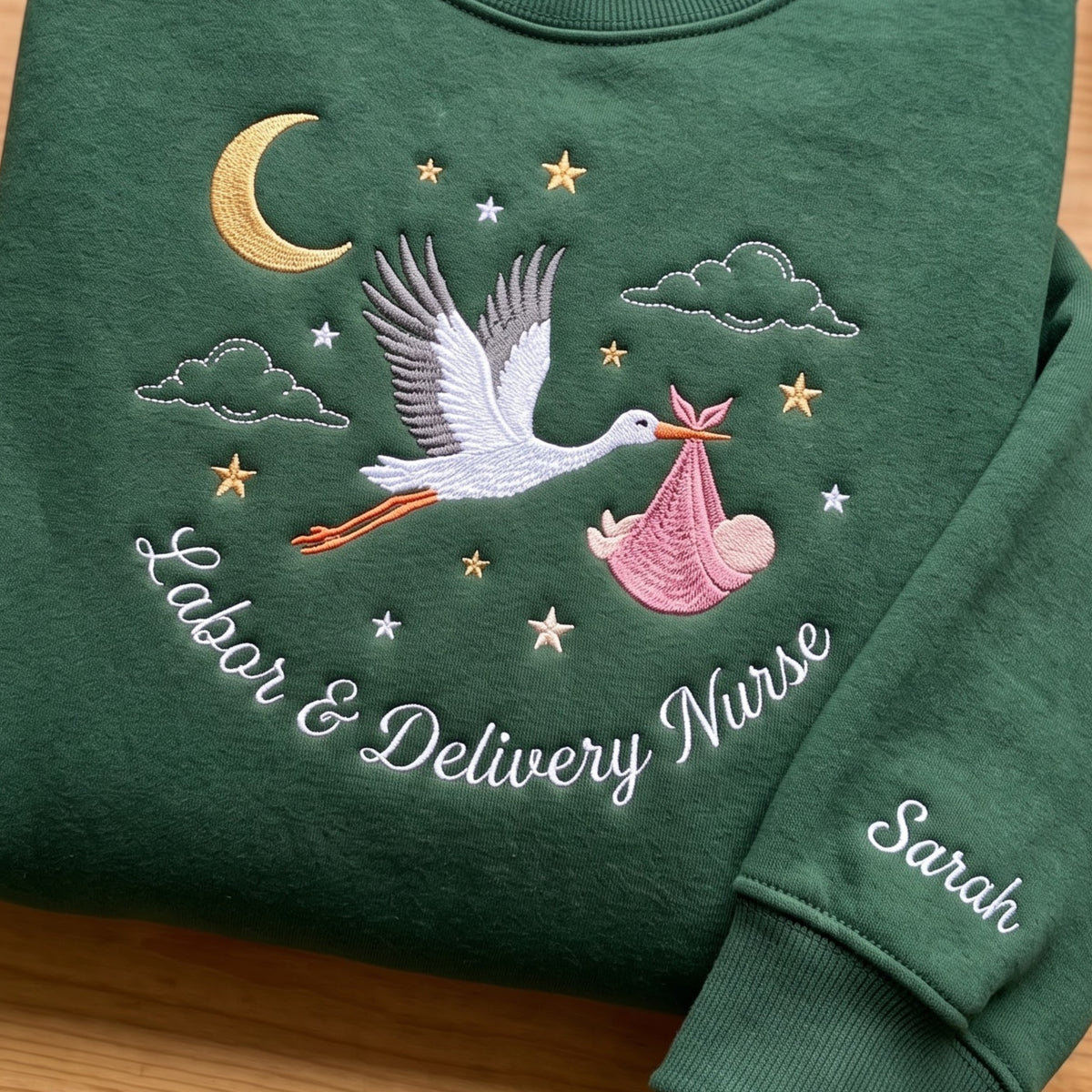 Personalized Labor & Delivery Nurse Stork Baby embroidered sweatshirt — front view