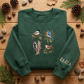 Personalized Four Wild Birds Chickadee Bluebird Woodpecker Wren Nature embroidered sweatshirt — front view