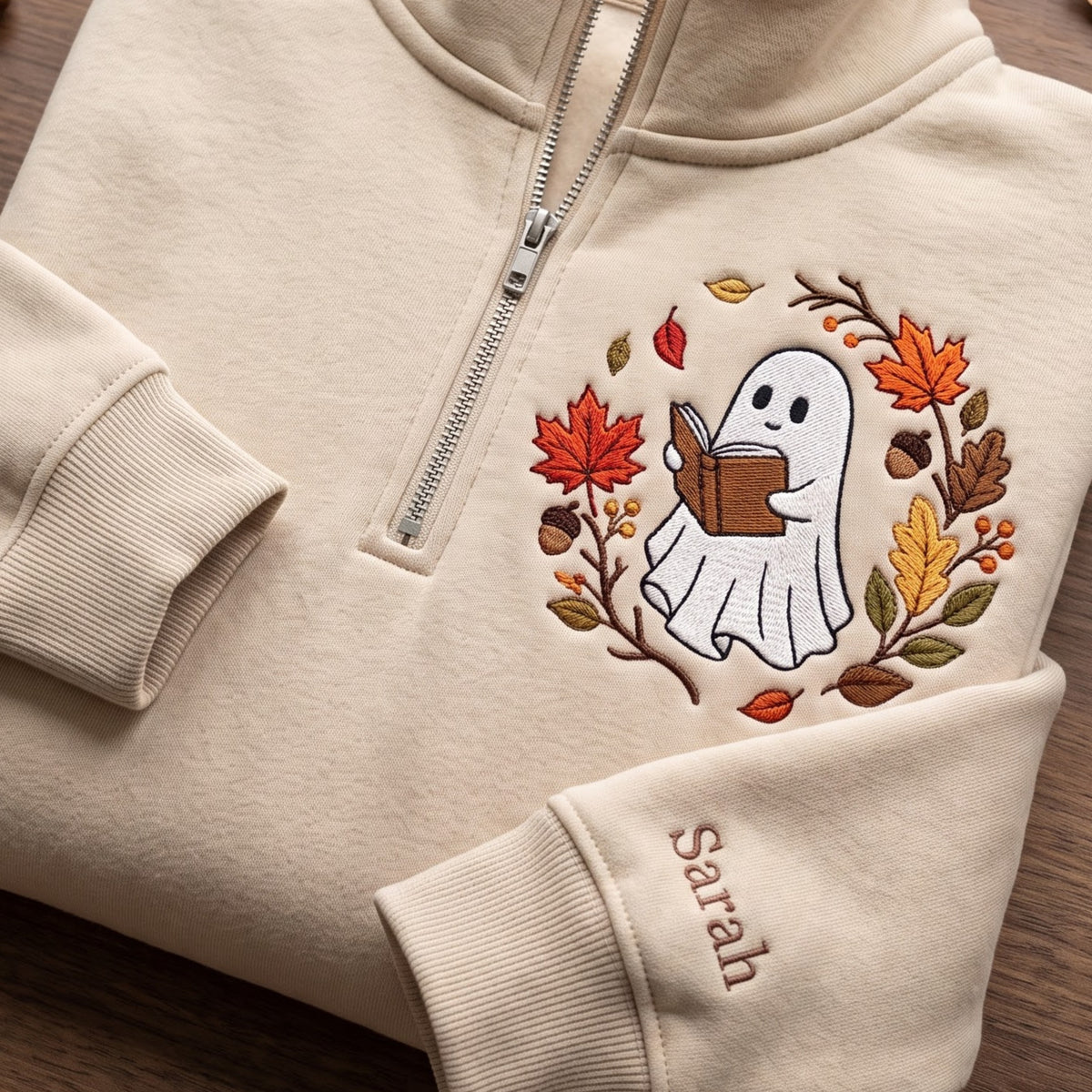 Personalized Fall Ghost Reading Book Autumn Leaves Wreath embroidered quarter-zip — front view