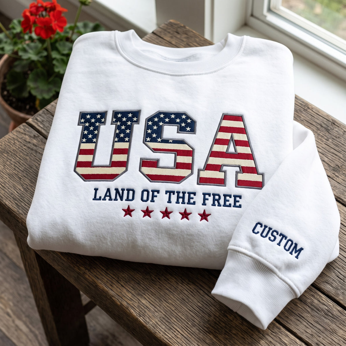 Personalized USA Land of the Free American Flag Letters Stars embroidered sweatshirt — front view