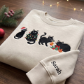 Personalized Christmas Black Cats Santa Hat Lights Ornaments embroidered sweatshirt — front view