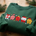 Christmas Dental Tooth Characters Holiday Cute Kawaii Dentist embroidered sweatshirt — front view