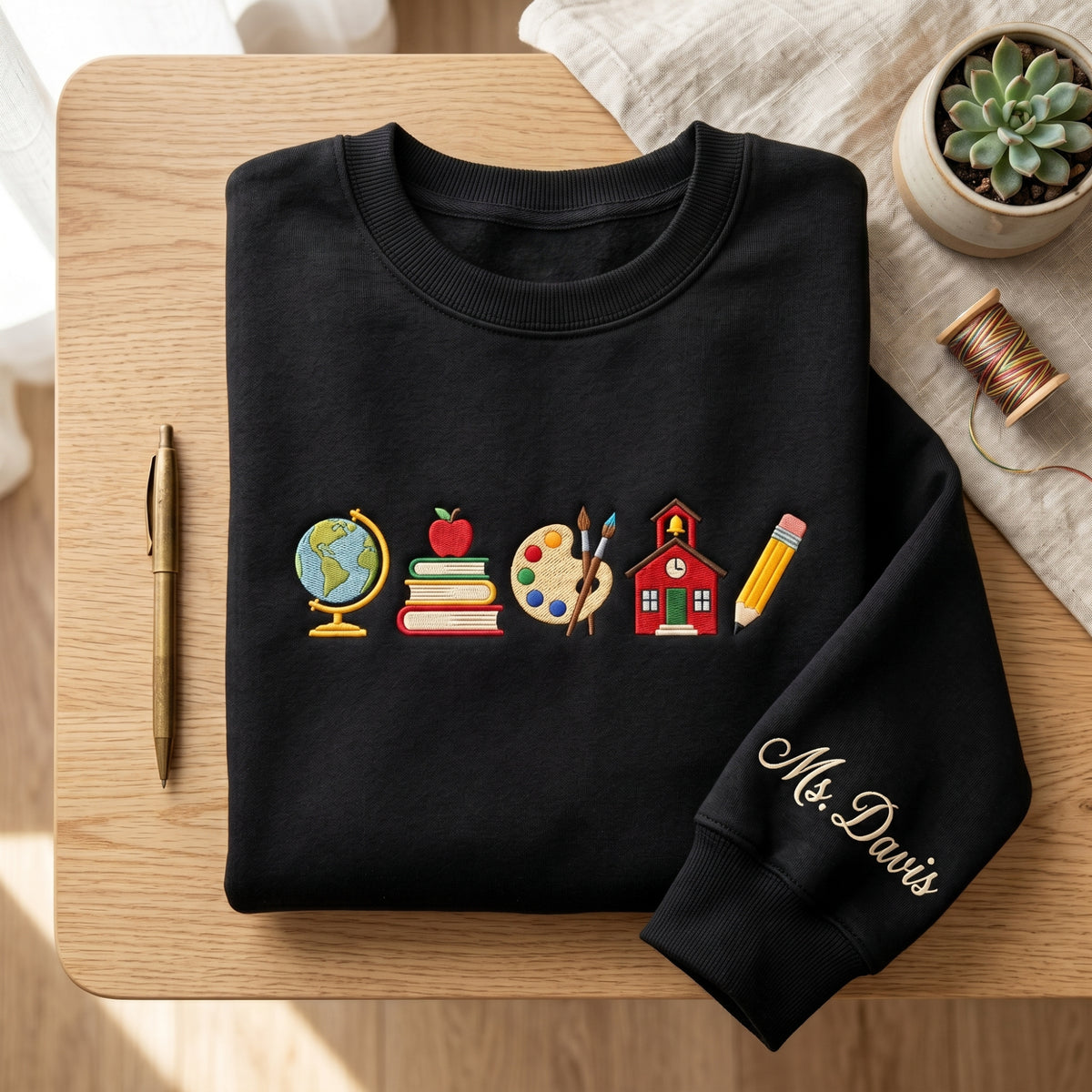 Personalized Teacher Name Globe Apple Books Palette Schoolhouse Pencil embroidered sweatshirt — front view