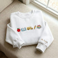 Personalized Teacher Name Apple Book School Bus Pencil Stacked Books embroidered sweatshirt — front view