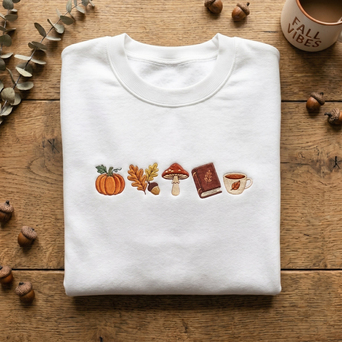 Fall Pumpkin Mushroom Book Acorn Leaf Tea Cup embroidered sweatshirt — front view