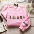 Personalized Camping Pine Tree Tent Campfire Backpack Wildflower embroidered sweatshirt — front view