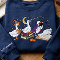 Personalized Halloween Reading Geese Witch Vampire Cape Books Pumpkin Moon Bats embroidered sweatshirt — front view