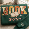 Personalized Bookworm Open Book Daisy Floral Letters Custom Name Sleeve embroidered sweatshirt — front view