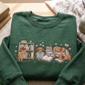Dachshund Book Lover Reading Dogs Library Shelf embroidered sweatshirt — front view