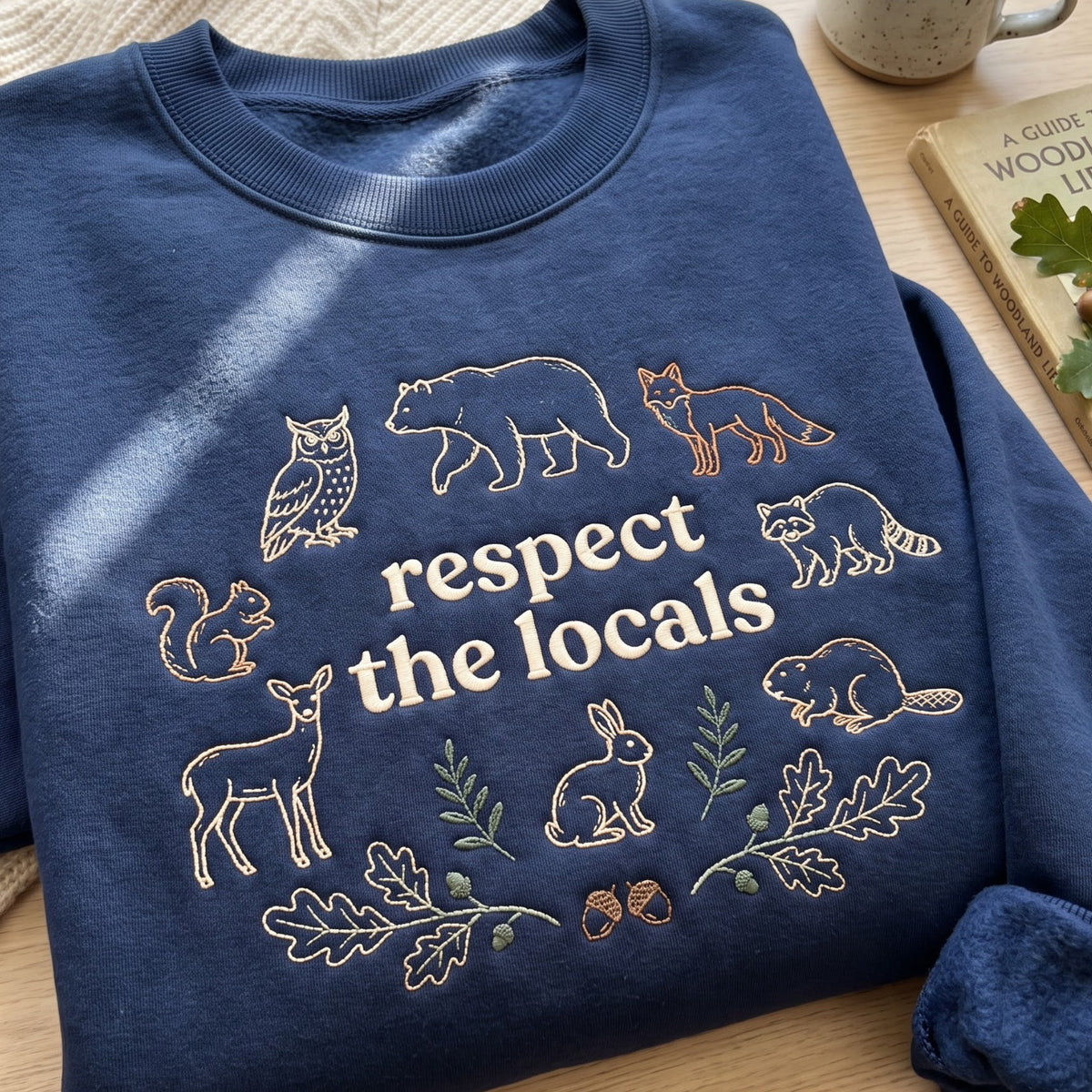 Respect the Locals Woodland Animals Bear Fox Owl Deer Rabbit Raccoon Squirrel Beaver embroidered sweatshirt — front view