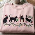 Christmas Black Cats Santa Hat Reindeer Gift Box Holiday Garland Lights embroidered sweatshirt — front view