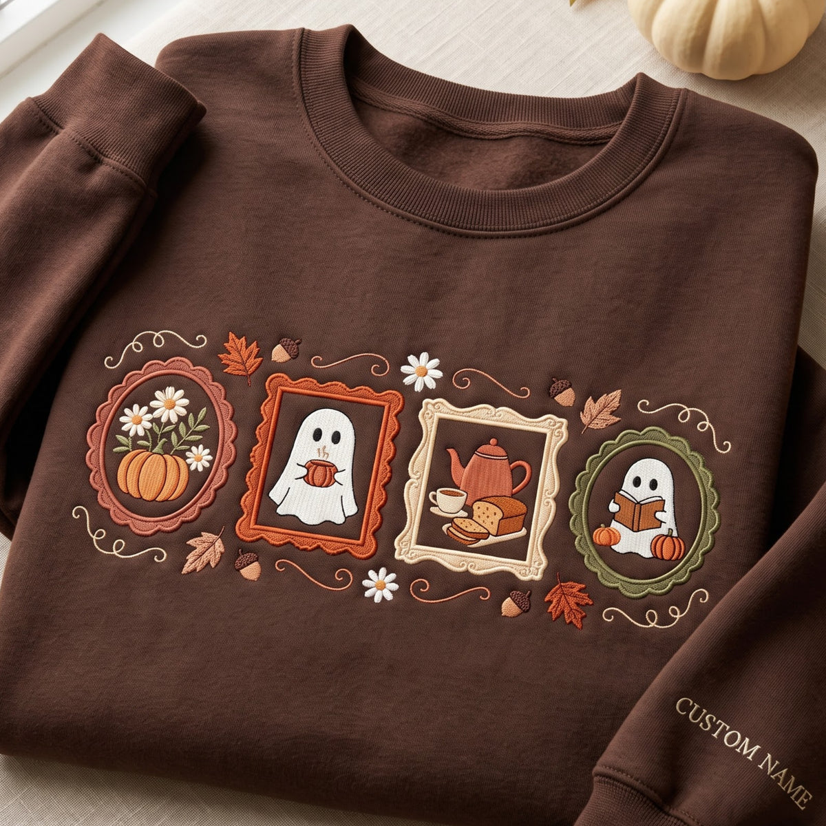 Personalized Halloween Ghost Autumn Frames Pumpkin Tea Book Cozy Fall embroidered sweatshirt — front view