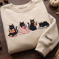 Personalized Black Cats Reading Books Cozy Blanket Coffee Cup embroidered sweatshirt — front view