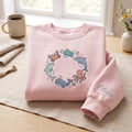 Personalized Ocean Sea Animals Circle Whale Dolphin Turtle Crab Octopus embroidered sweatshirt — front view