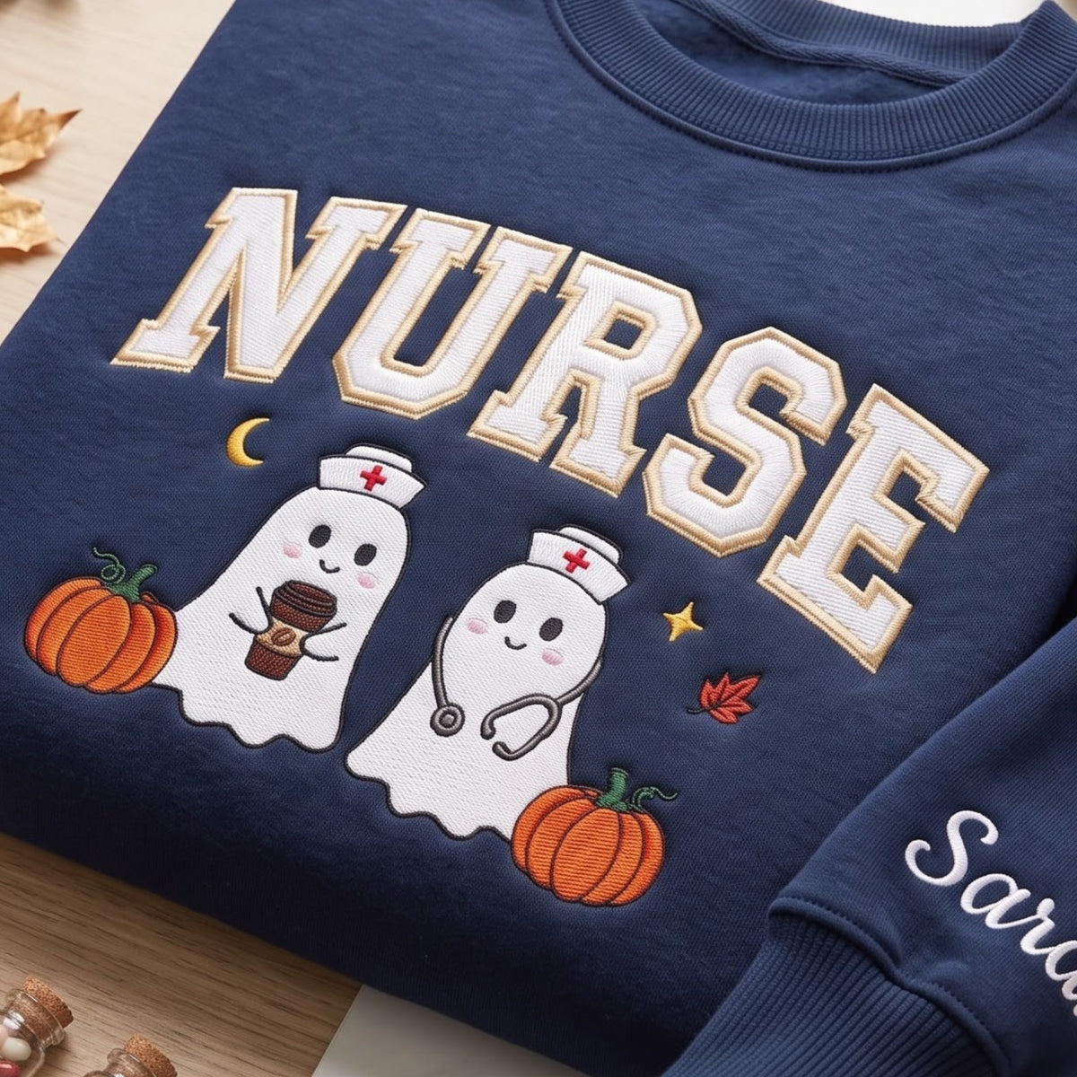 Personalized Halloween Nurse Ghost Pumpkin Stethoscope Fall embroidered sweatshirt — front view