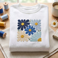 Blue Daisy Floral Tile Retro Wildflower Bouquet embroidered sweatshirt — front view