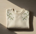 Cherry Blossom Floral Branch Shoulder Botanical embroidered sweatshirt — front view
