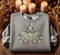 Luna Moth Moon Phase Triple Moon Wildflower Celestial Botanical embroidered sweatshirt — front view