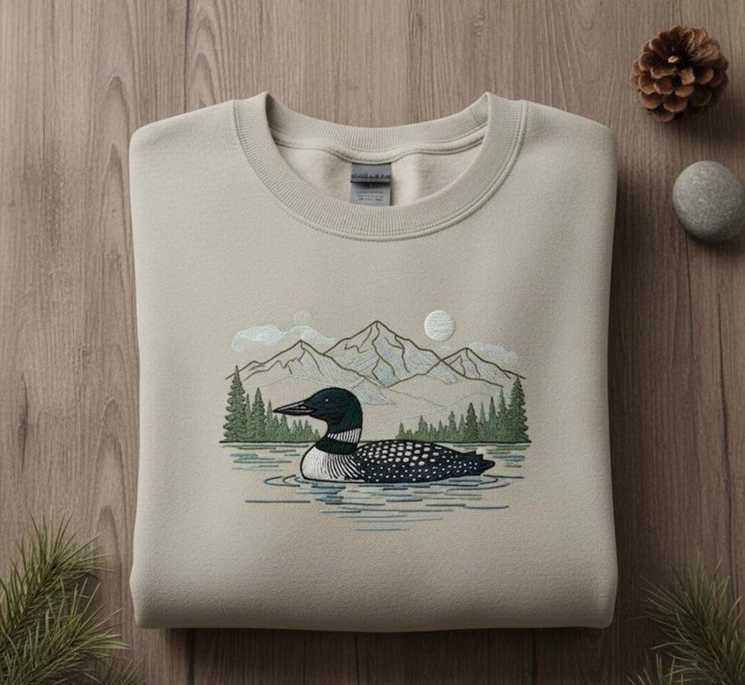 Common Loon Mountain Lake Forest Scene Nature Wildlife embroidered sweatshirt — front view