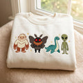 Cryptid Crew Bigfoot Mothman Nessie Alien Cute Kawaii embroidered sweatshirt — front view