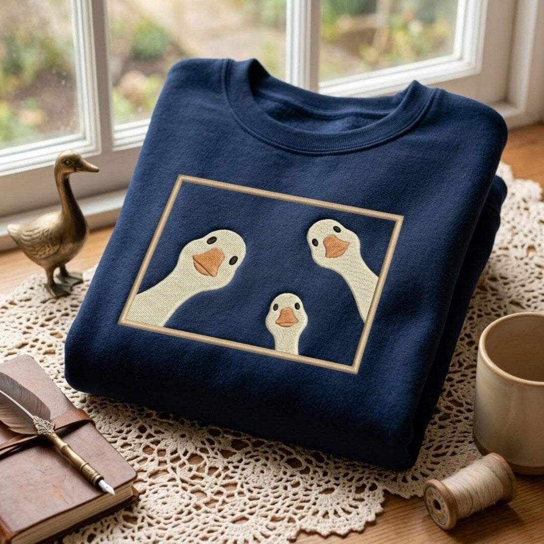 Funny Geese Trio Peeking Frame Family Portrait embroidered sweatshirt — front view