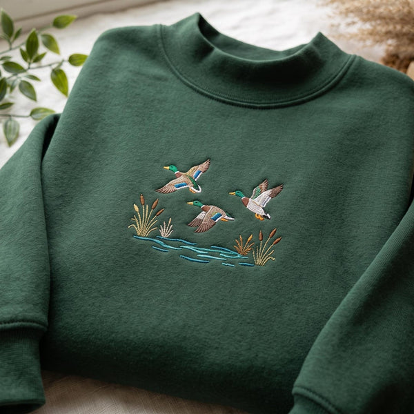 Flying Mallard Ducks Wetland Cattails Wildlife Scene embroidered mock neck sweatshirt — front view