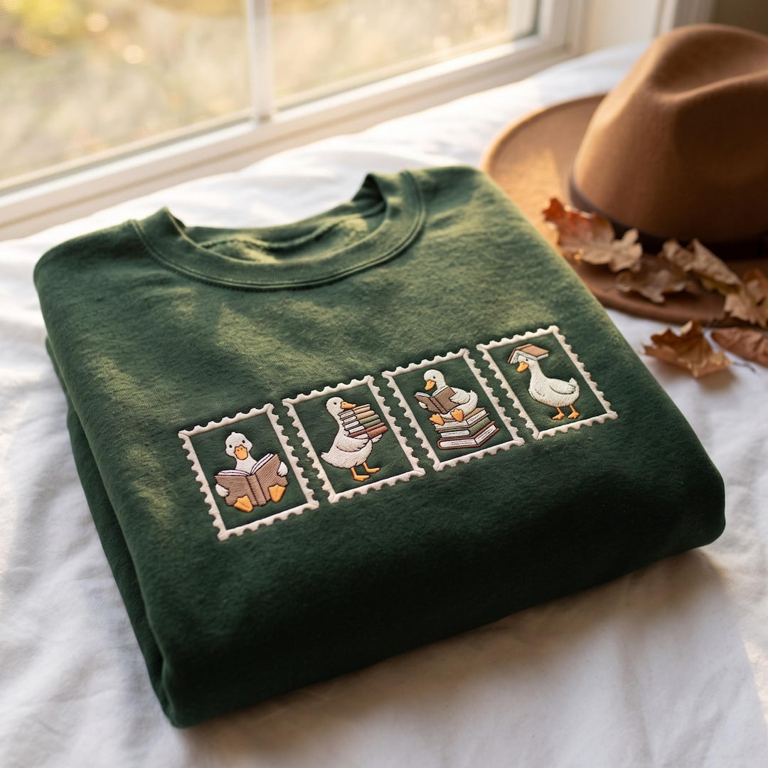 Book Lover Goose Reading Stamp Postage Four Panel embroidered sweatshirt — front view