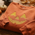 Halloween Jack O Lantern Pumpkin Face Spooky embroidered sweatshirt — front view