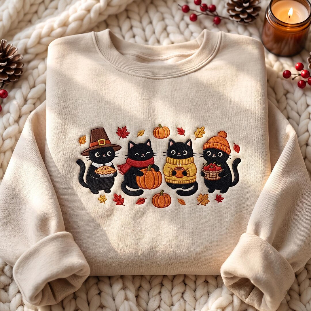 Four Black Cats Thanksgiving Pilgrim Pumpkin Fall Leaves Autumn embroidered sweatshirt — front view