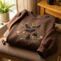 Halloween Bats Floral Wreath Crescent Moon Stars Botanical embroidered sweatshirt — front view