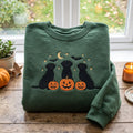Halloween Three Black Labs Pumpkin Jack-O-Lantern Moon Bats Stars embroidered sweatshirt — front view