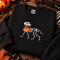 Halloween Skeleton Dog Trick or Treat Pumpkin Bucket embroidered hoodie — front view