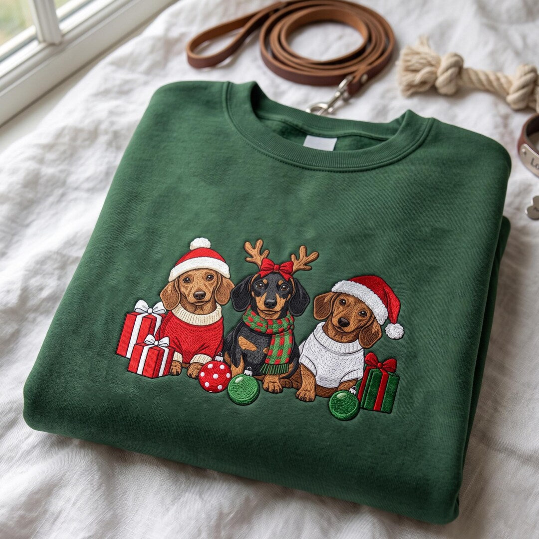 Three Christmas Dachshunds Santa Reindeer Holiday Gifts Ornaments embroidered sweatshirt — front view
