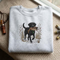 Black Lab Duck Hunting Retriever Cattails Marsh Wildlife embroidered sweatshirt — front view