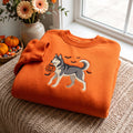 Halloween Husky Dog Pumpkin Bucket Bats Spooky embroidered sweatshirt — front view