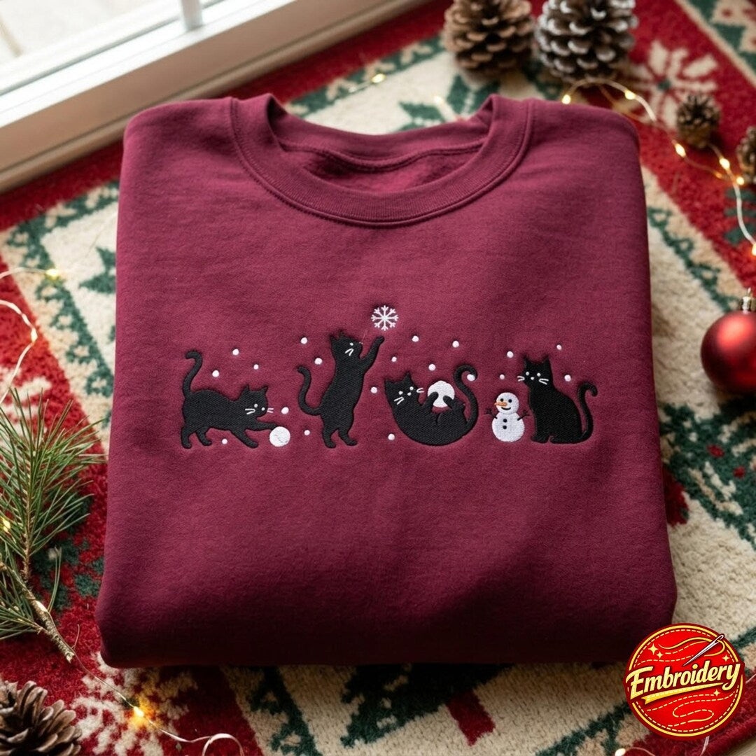 Christmas Black Cats Playing Snow Snowman Holiday embroidered sweatshirt — front view