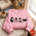 Black Cats Reading Books Cozy Blanket Glasses Kindle Coffee embroidered sweatshirt — front view