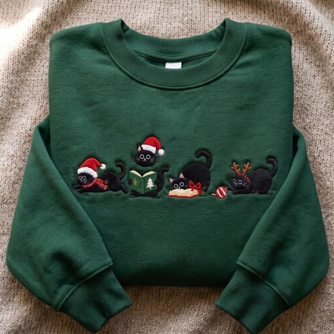 Christmas Black Cats Santa Hat Reindeer Reading Book Holiday embroidered sweatshirt — front view