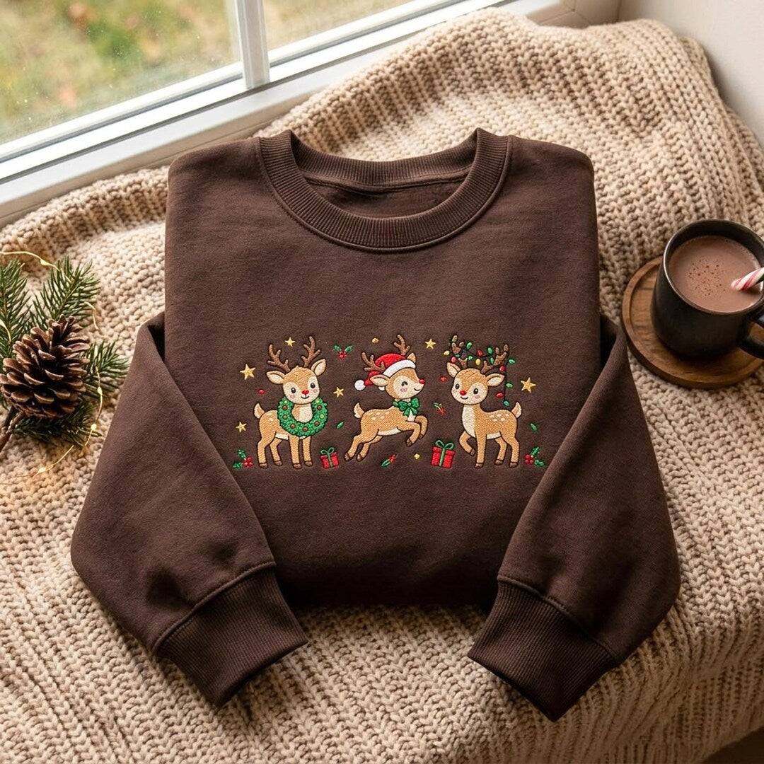 Christmas Three Reindeer Wreath Santa Hat Lights Holiday embroidered sweatshirt — front view