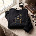 Halloween Haunted House Bats Crescent Moon Pumpkins Spooky Trees embroidered sweatshirt — front view