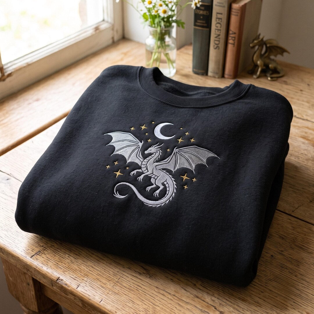 Dragon Moon Stars Fantasy Bookish Witchy embroidered sweatshirt — front view