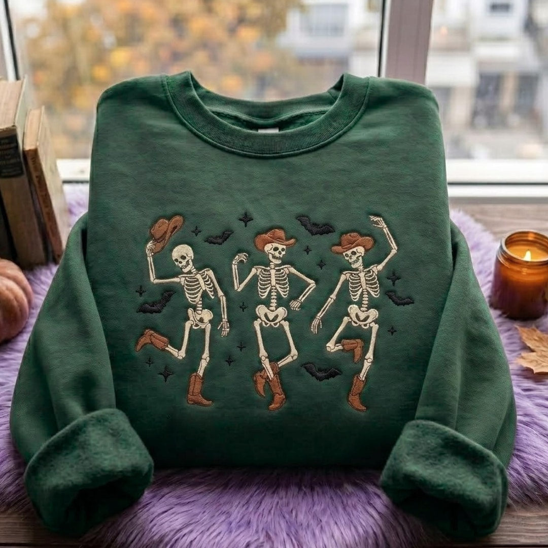 Halloween Dancing Cowboy Skeletons Bats Western embroidered sweatshirt — front view