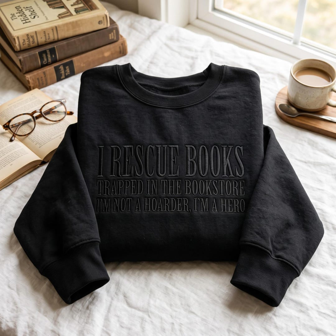 I Rescue Books Trapped in the Bookstore Funny Book Lover Reader embroidered sweatshirt — front view