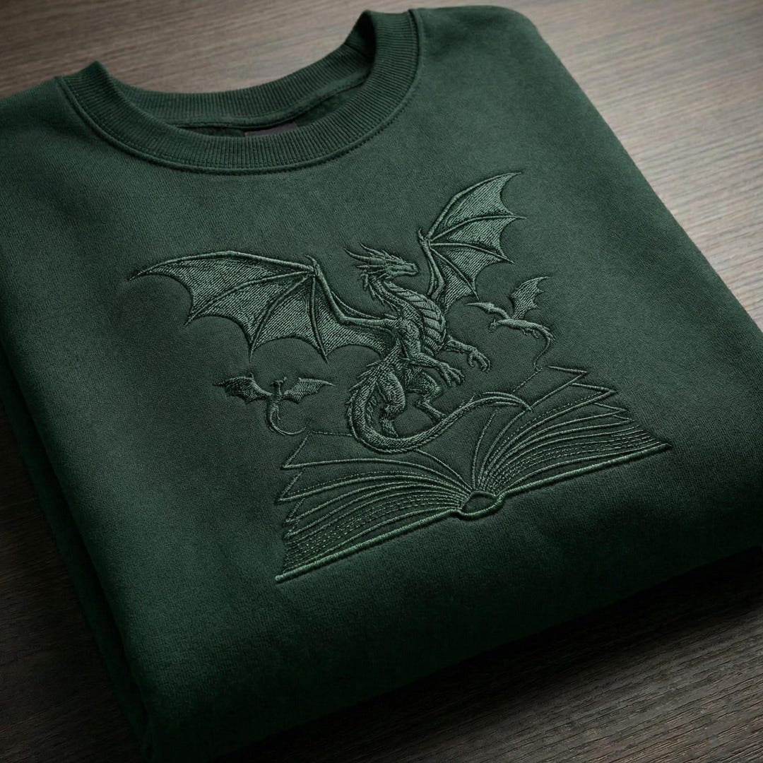 Dragon Flying Over Open Book Fantasy Book Lover embroidered sweatshirt — front view